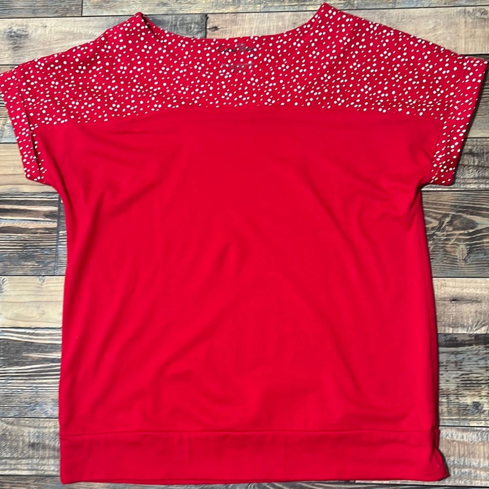 Red top shirt with white polka dots